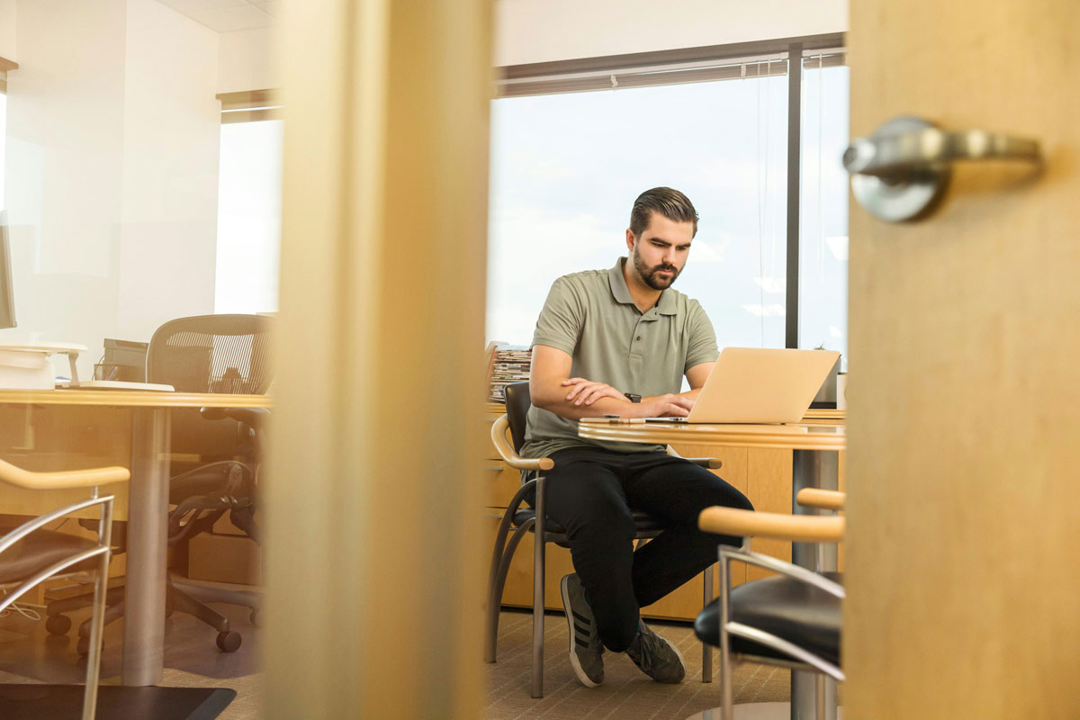 Employee rights - Man Using Laptop on Table