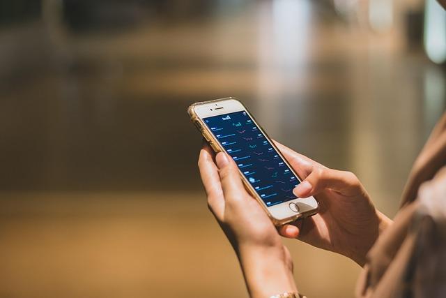 Someone holding a phone